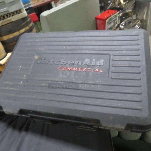 Kitchenaid commercial immersion blender in carry case, model KHBC4180B. Case shows signs of wear.