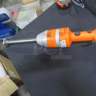 One Dynamic Junior Plus immersion blender, 115V, orange and silver, no cord, in used condition.
