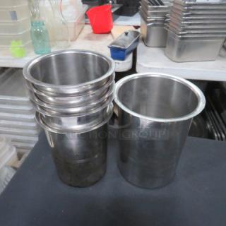 Assorted size Bain Marie pots, stainless steel, set of six, shown in used condition. Ideal for food service or storage.