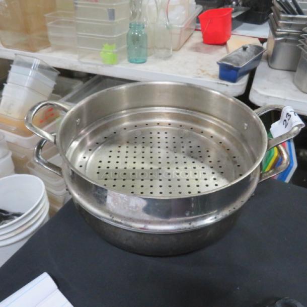 Williams Sonoma 12-inch stainless steel double boiler with perforated insert, gently used condition, sturdy handles.