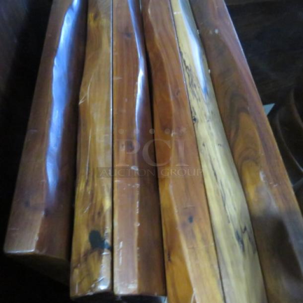 Solid wooden table legs with a rich finish, intended for a 36x36x30 pedestal table. Visible natural wood grain and minor wear.