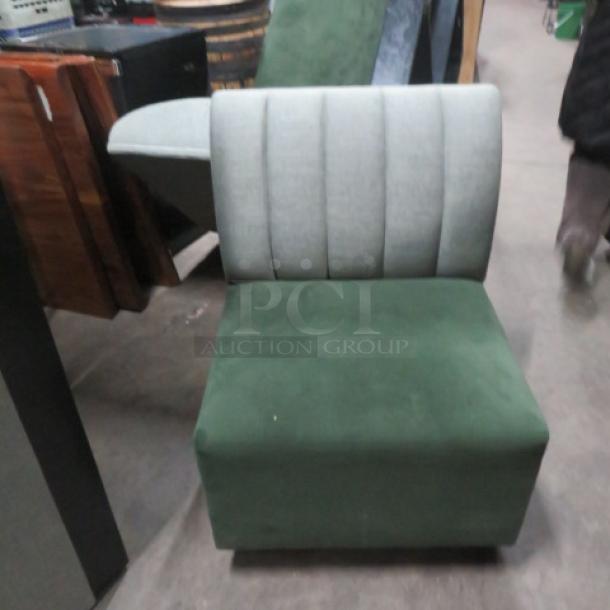 Single-sided green cushioned booth bench, 25x26x34 inches, subtle striped backrest, good condition.