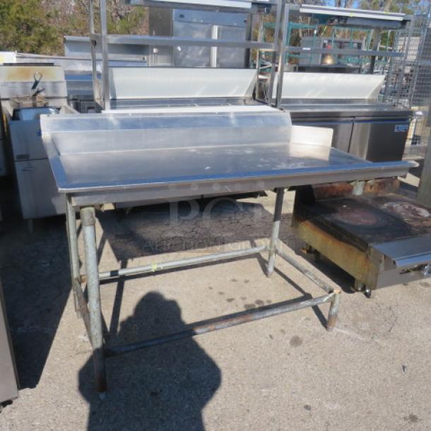 Stainless steel dishwasher table, 60.5"x29.5"x41", clean side design, sturdy metal legs, good condition.