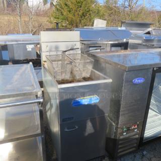 Pitco Natural Gas Deep Fryer, Model 35C+, with two baskets on casters. Measures 15"x30"x46".