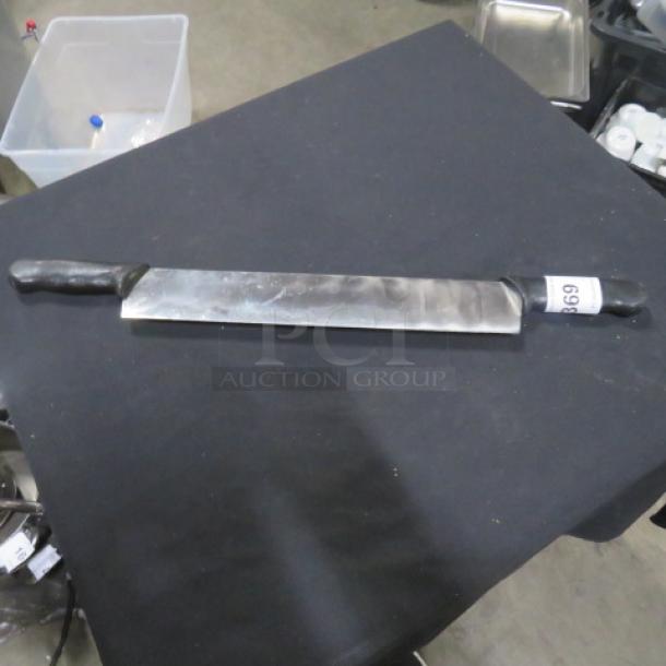 Double handle knife with stainless steel blade, black handles; visible label with number 669.