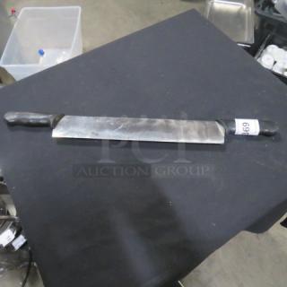 Double handle knife with stainless steel blade, black handles; visible label with number 669.