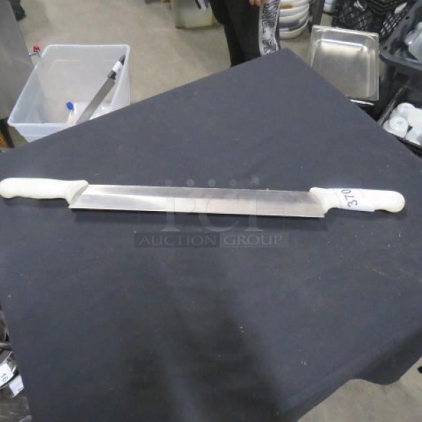 Double handle knife with white grips, stainless steel blade, excellent condition. Marked "370" on blade edge for identification.