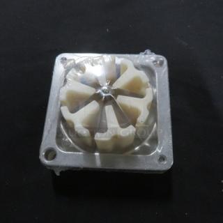 New vegetable cutter blade in packaging, square metal frame, six-section design.