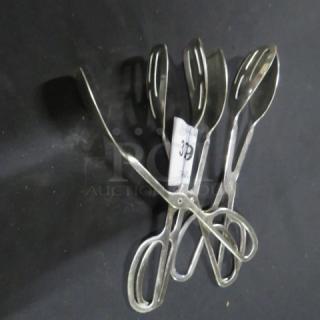 Stainless steel tongs, model 3XBID, featuring a sleek design and ergonomic handles, in excellent condition.