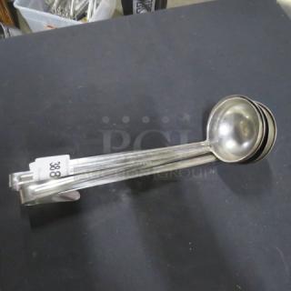 8oz stainless steel ladle, model 4XBID, in good condition. Features a smooth bowl, long handle, and visible lot tag "388".