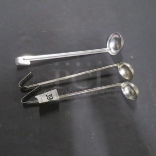 Assorted stainless steel ladles, three pieces, various sizes. Includes hooks for hanging. Visible label marked "39C".