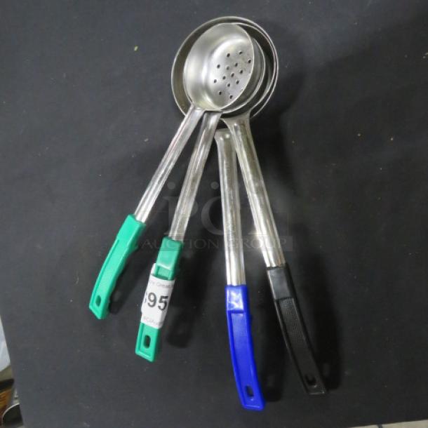 Assorted size perforated spoodles with colored handles, stainless steel, good condition, includes auction tag 95.