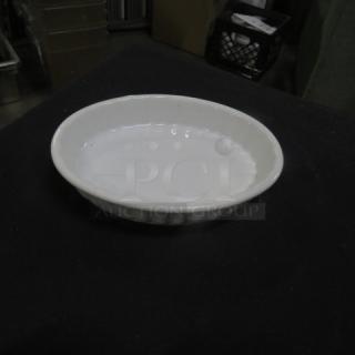 Acopa Oval Souffle Dish, 5.5x4 inches, white ceramic, in good condition, ribbed outer surface.