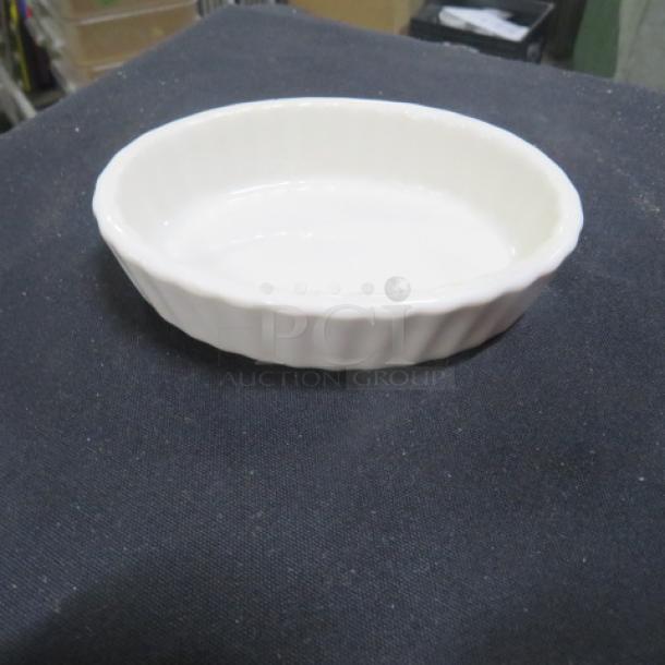 Acopa Tuxton oval soufflé dish, 4.5x3.5 inches, white ceramic, fluted sides, pristine condition, model 9XBID.