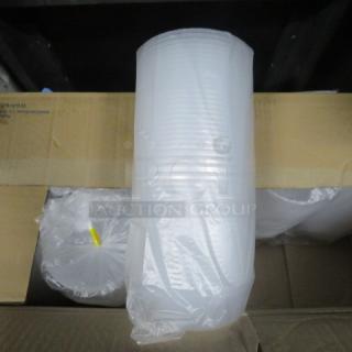 One lot of 8oz transparent deli containers, new in packaging, wrapped in clear plastic, showcasing cylindrical shape.