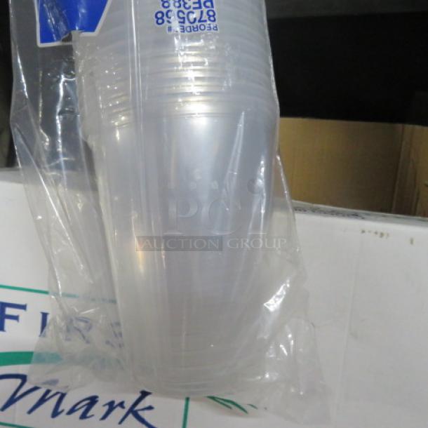One lot of 50 clear 32oz deli containers in plastic packaging, new condition, ideal for food storage.