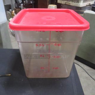 8 Quart clear food storage container with red lid, marked with measurement lines up to 8 quarts and 7.5 liters.