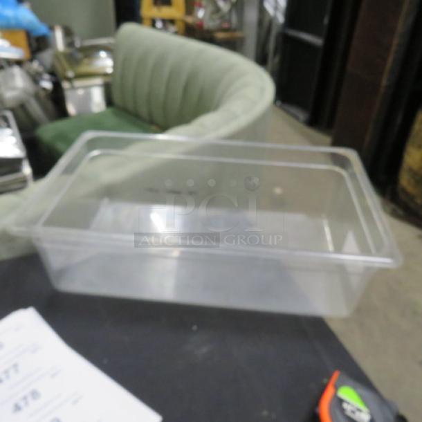 Clear full-size 6-inch deep food storage container, good condition, ideal for commercial kitchens. No visible markings.