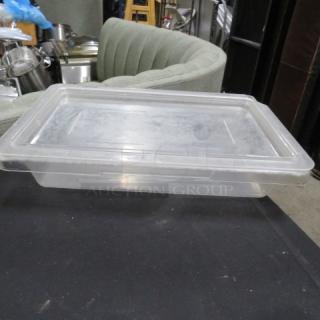 1.75 gallon clear food storage container with lid, in used condition. Model 5XBID. Suitable for kitchen or restaurant use.