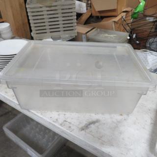 13-gallon clear food storage container with lid, plastic, in good condition, sturdy design, suitable for bulk storage.