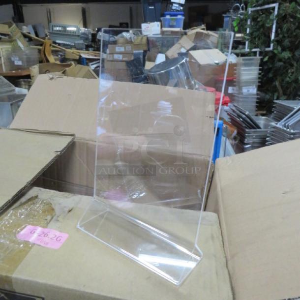 Lot of 10 new tabletop menu holders, clear acrylic, sleek design, pristine condition, ideal for restaurants or events.