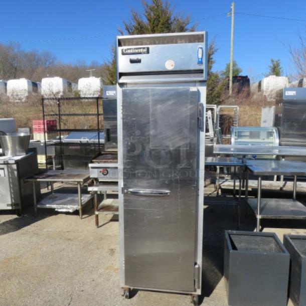 Continental 1F freezer, 1 door, 3 racks, on casters, 36x35x83 inches, 115V, stainless steel, used condition, $7013.99.