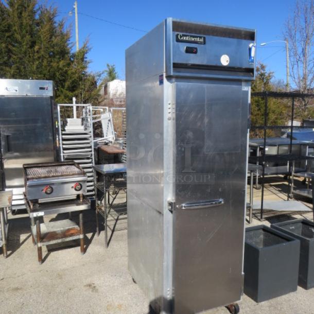 Continental 1 Door Freezer, Model 1F, with 3 racks on casters, 36x35x83 inches, 115 Volt, stainless steel.