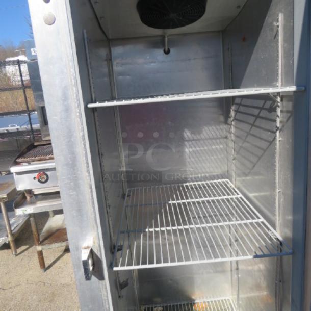 Continental 1 Door Freezer, Model 1F, 36x35x83 inches, includes 3 racks, on casters, shown open.