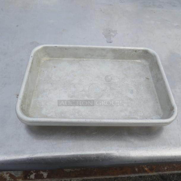 1/4 Size Sheet Pan; metal; used condition; visible wear; no markings; ideal for baking or roasting small batches.