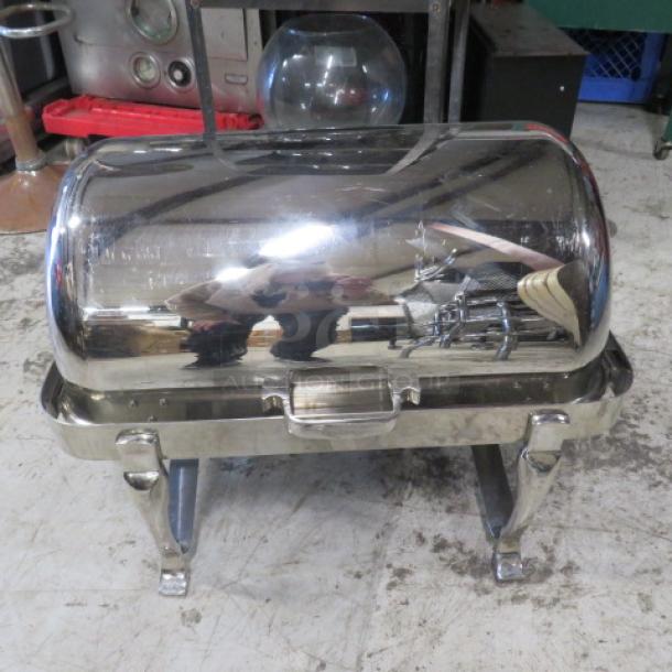 Stainless steel rolltop chafer, heavy duty, full size, polished finish, sturdy legs, excellent condition.