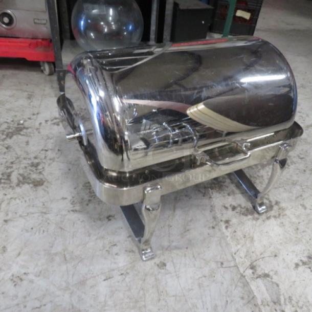 Stainless steel full-size rolltop chafer, heavy duty, polished finish, used condition, ideal for catering events.