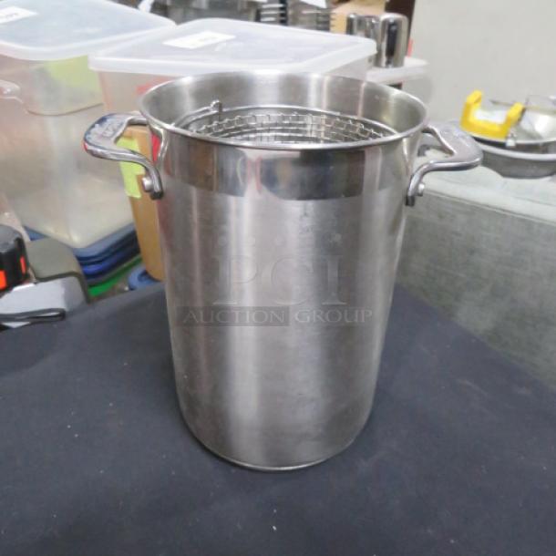 All Clad stainless steel pasta cooker with basket, featuring durable construction and ergonomic handles, in good condition.