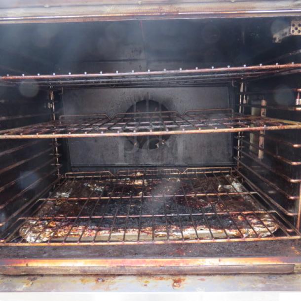 Southbend B-Series double stack electric convection oven interior; working condition; 38x35x65 inches; 208/240 Volt.