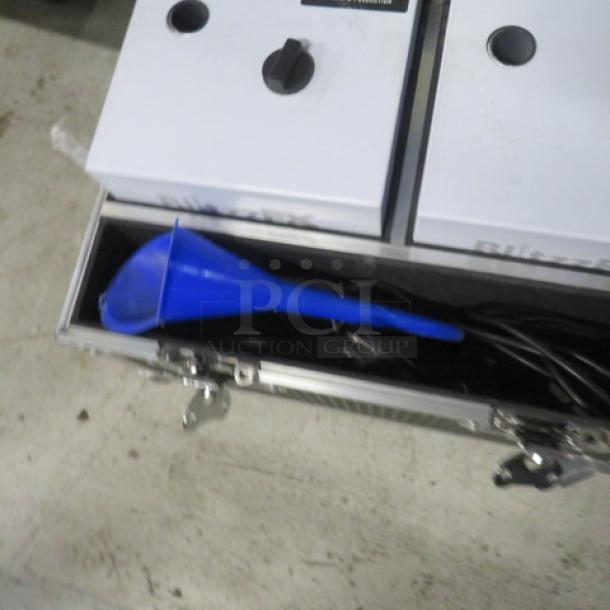 PRO-X BLITZZ FX Dual Cold Spark Machines with aluminum covers in flight case. Includes blue funnel. Non-pyrotechnic.