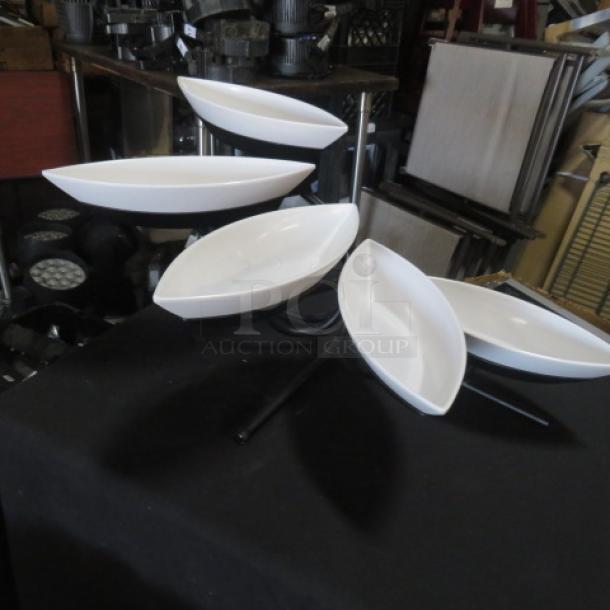 Black metal 5-tier buffet display server with five white melamine canoe-shaped food holders. Excellent condition.