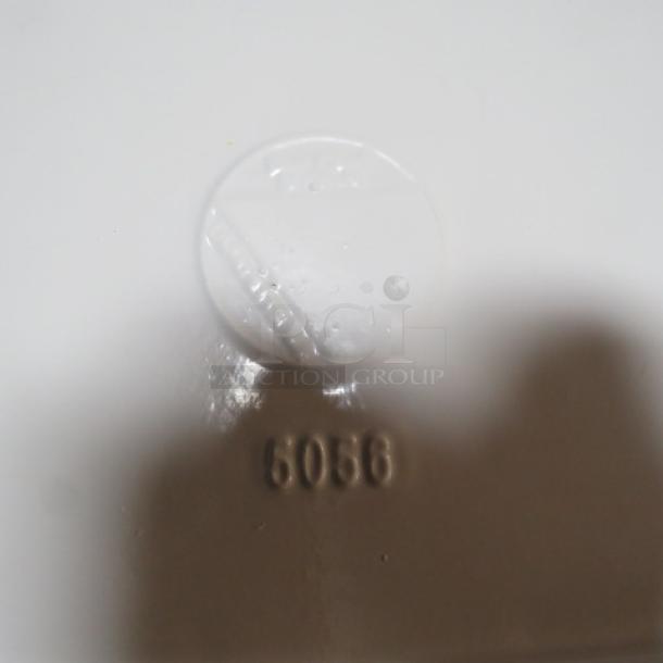 BON CHEF Ivory Sandstone Cast Aluminum Platter, Model 5056, 21x13 inches, embossed with "5056", priced at $332.49.