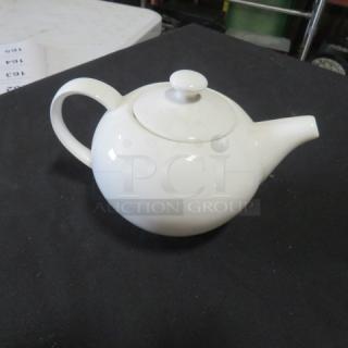 Fortessa Bone China Tea Pot with lid, glossy white finish, classic design, excellent condition, labeled "Fortessa 3XBID."