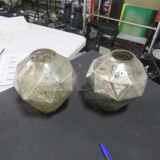 Silver crackle candle holders, geometric design, set of two, visible wear, reflective finish, decorative use.