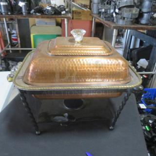 Hammered copper half-size chafer with glass knob and handles. Features twisted metal base. Excellent condition.