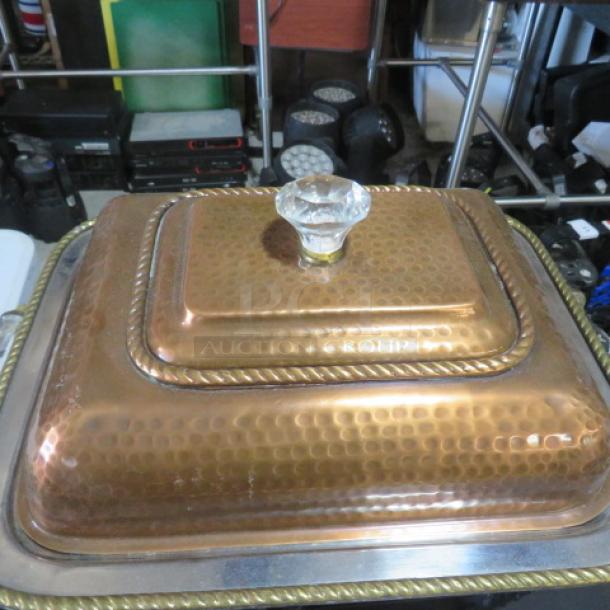 Hammered copper half-size chafer with glass knob and handles. Features textured design and rope detailing. Good condition.