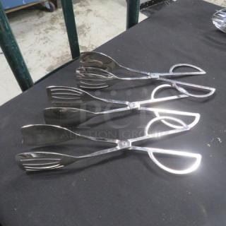 Stainless steel buffet tongs, set of three. Polished finish, scissor-style design, excellent condition. Ideal for catering.