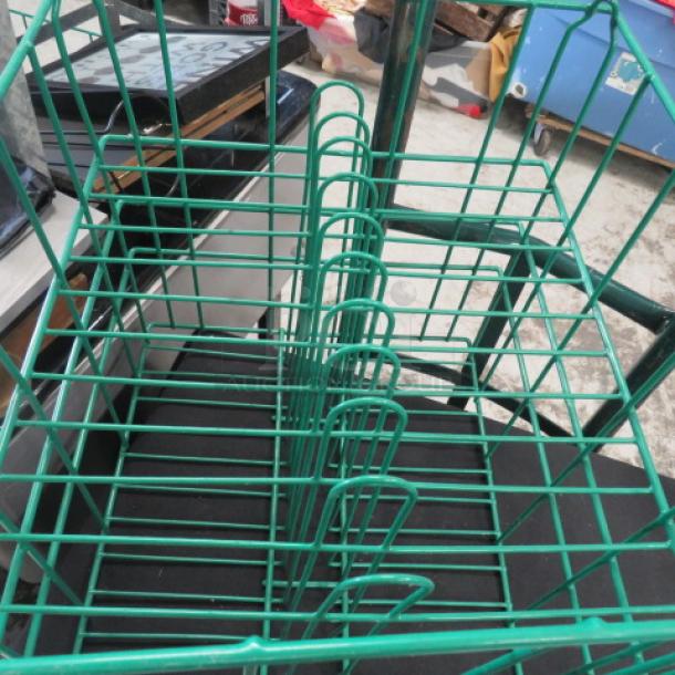 Green metal plate carrier rack, dimensions 15x15x16 inches, in good condition, designed for efficient plate storage.