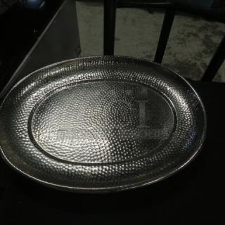 17.5x13.5 stainless hammered platter, oval shape, shiny finish, excellent condition, textured design.