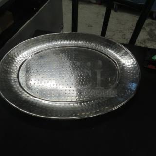 20.5x16 inch stainless steel hammered platter, gently used, showcasing a textured surface.