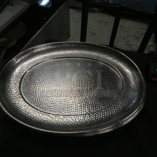 20.5x16 stainless steel hammered platter, oval shape, textured surface, excellent condition.