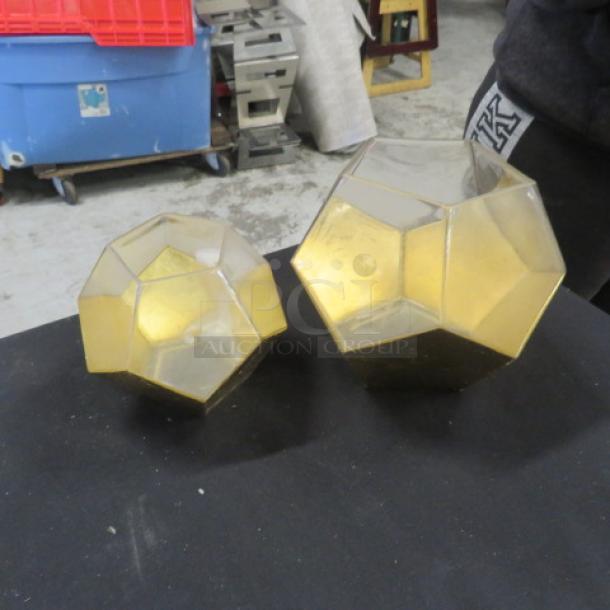 Geometric candle holders, gold finish, assorted sizes, modern design, hexagonal pattern, good condition.