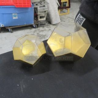 Geometric candle holders, gold finish, assorted sizes, modern design, hexagonal pattern, good condition.