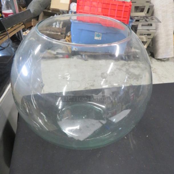 12x10 clear glass fish bowl in good condition, no visible chips or cracks, ideal for home decor or aquariums.