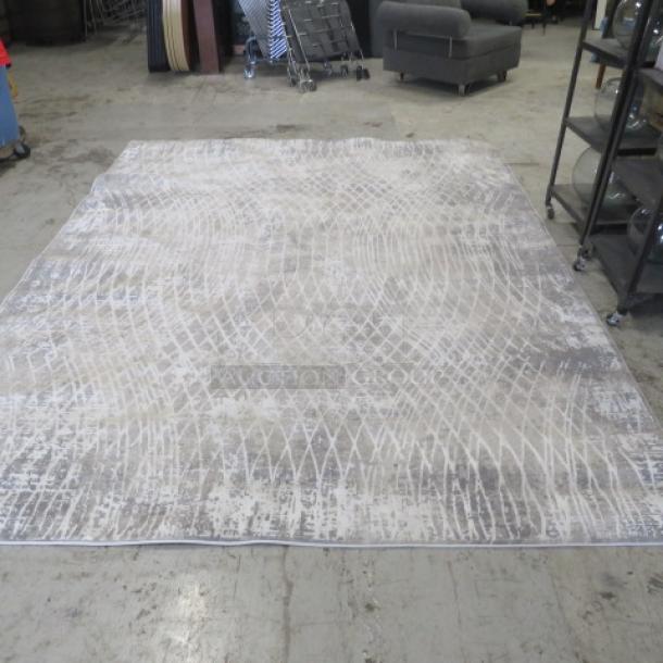 Large rug, 95x121.5 inches, beige and gray geometric pattern, excellent condition, suitable for living room or office.