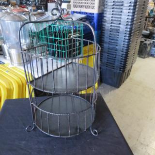 Metal 2-tier holder, 12x25 inches. Features wireframe design, sturdy base, and elegant scroll details. Ideal for display.